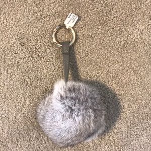 light grey furry keychain accessory